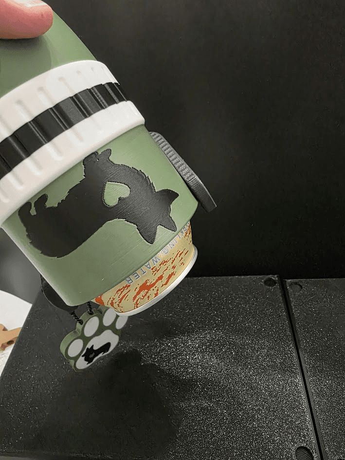 Dog breed koozie held with a can inside